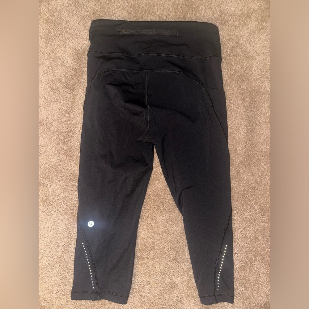 Lulu Lemon Extra mile crop reflective 23”